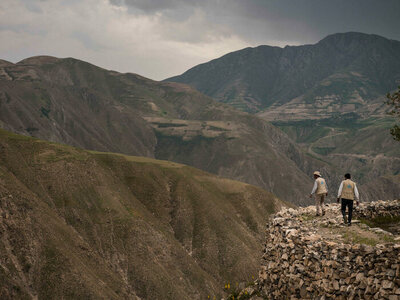 Two WFP staff on mountain tops in Afghanistan 