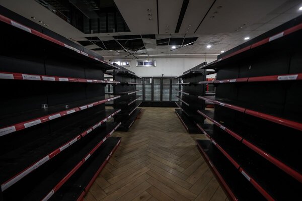Empty shelves in shops in Gaza
