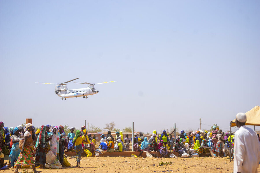 An UN Humanitarian Air Service chopper lands in Tirao, Region du North in Burkina Faso. Photo: WFP/Cheick Omar Bandaogo